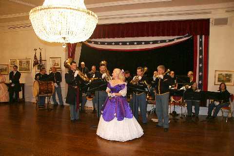As the ball resumes the band assembles to play Aura Lea.